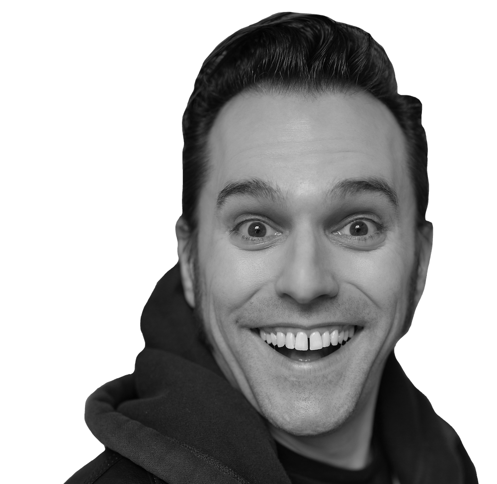 Paul Connolly - Actor + Comedian + Improviser (happy smiling face towards camera)